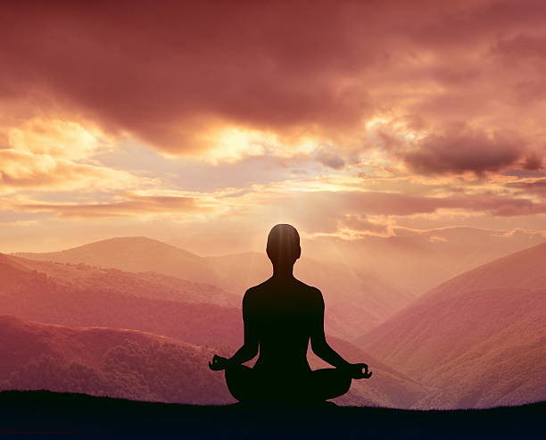 istock Yoga silhouette on the mountain 535486484
