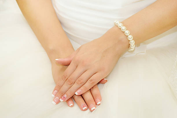 istock Hands of the bride 535487431