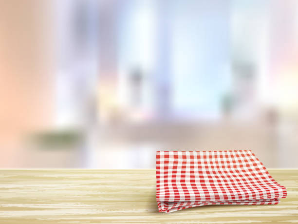 istock closeup of wooden desk and tablecloth in room 535488059