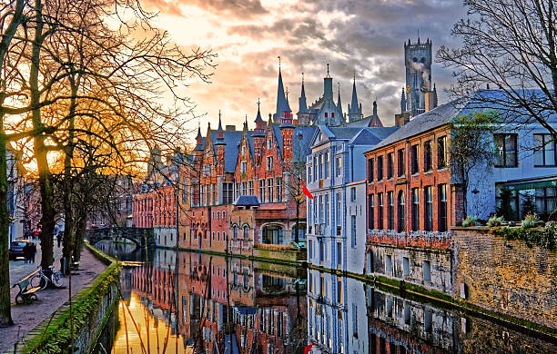 Canals of Bruges, Belgium Canals of Bruges (Brugge), Belgium. Winter evening view. belgium stock pictures, royalty-free photos & images