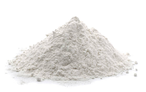 Flour Pile of wheat flour isolated on white flour stock pictures, royalty-free photos & images