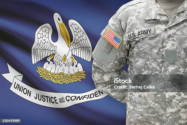 American Soldier With Us State Flag On Background Louisiana Stock Photo - Download Image Now
