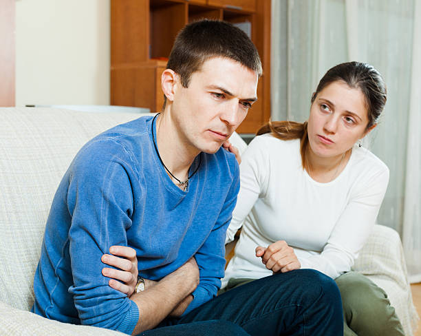 istock Loving woman consoling the depressed man 535494983