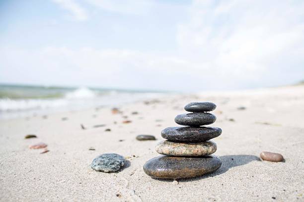 istock stone, tower, sea, beach, sand 535495654