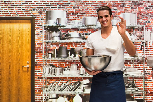 istock Chef showing ok sign in kitchen 535499692