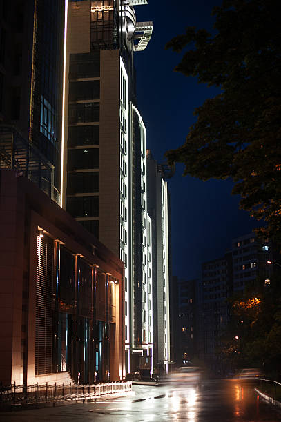 istock facade of a multi-storey building is illuminated at night 535504410