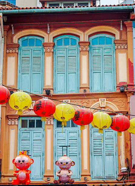 istock Chinese lanterns hanging against of old building 535505124