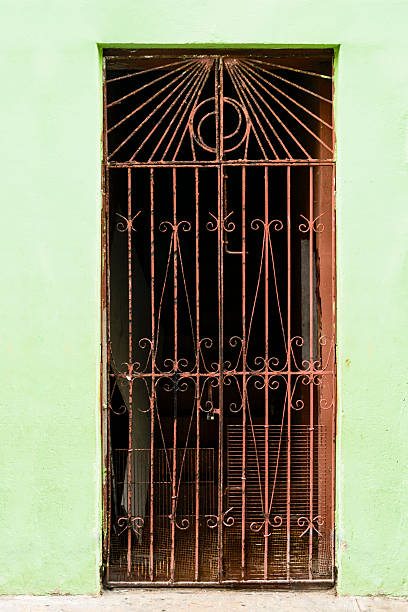 istock Colorful wall and rusted wrought iron door 535505686