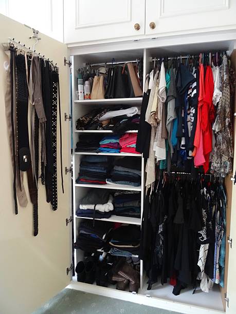 istock Belts and clothing in wardrobe 535507474