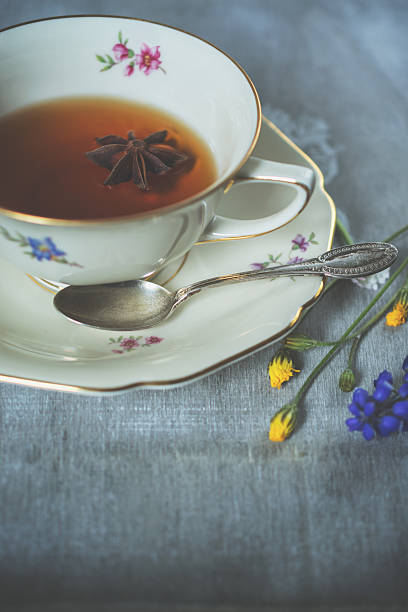 istock Antique cup of tea with anise stars 535510676