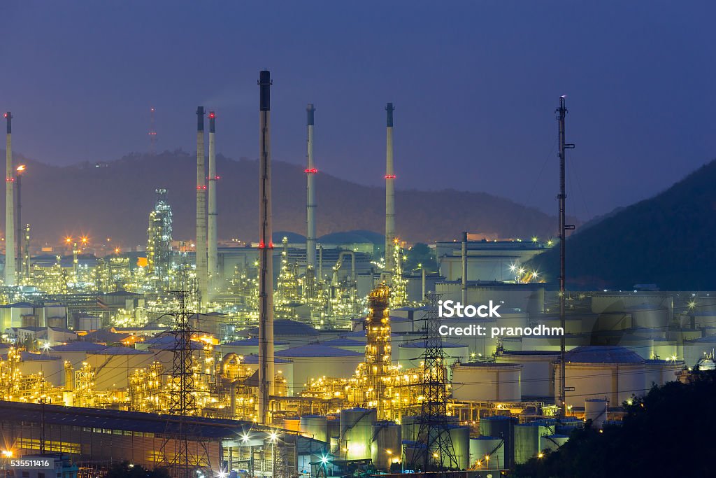 Night, aerial view automative refinery Night, aerial view automative refinery with mountain background Industry Stock Photo