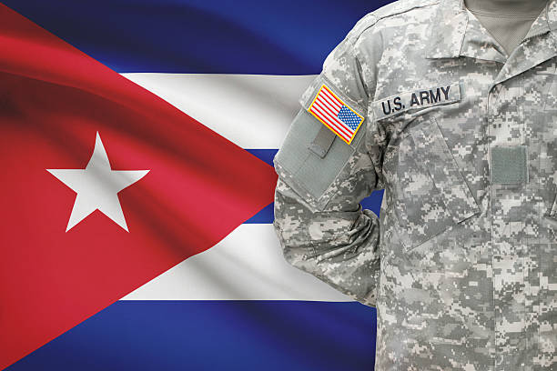 istock American soldier with flag on background - Cuba 535511651