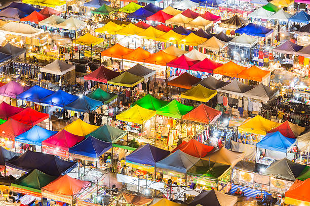 istock Top view, Multiple colourful rooftop night market 535513522