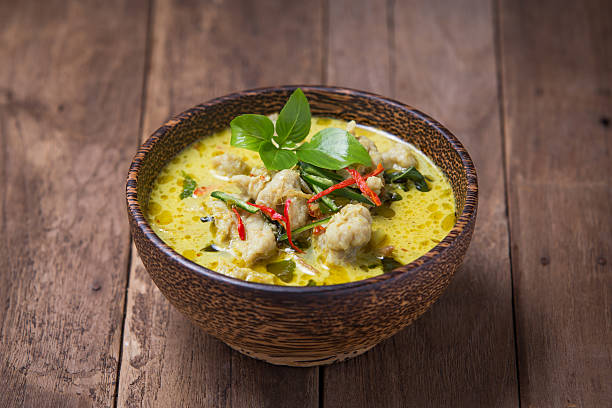 istock Green curry fish balls on wood background. 535513810