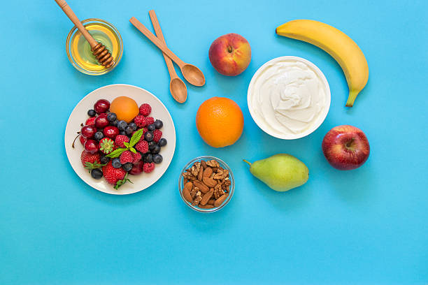 istock Yogurt and fruits, berries, nuts, honey as an ingredients. 535513838