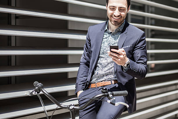 istock Businessman with bicycle on the phone 535514284