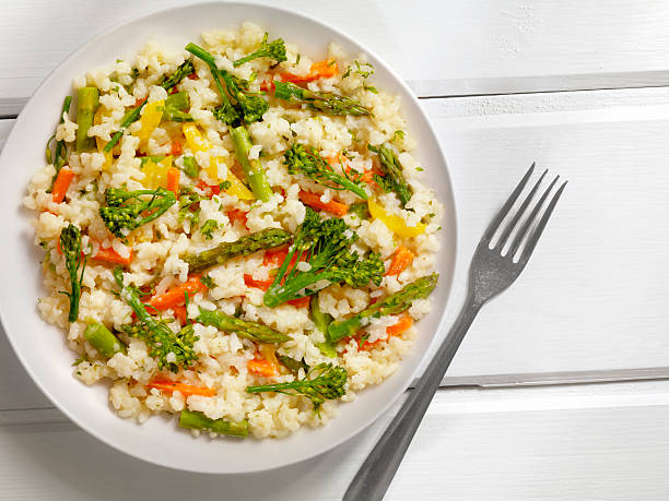 istock Vegetable Risotto with Fresh Parsley and Focaccia Bread 535514364