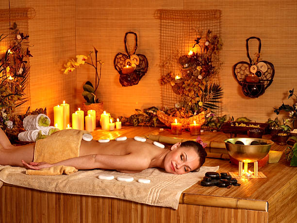 istock Woman getting stone therapy massage 535514999
