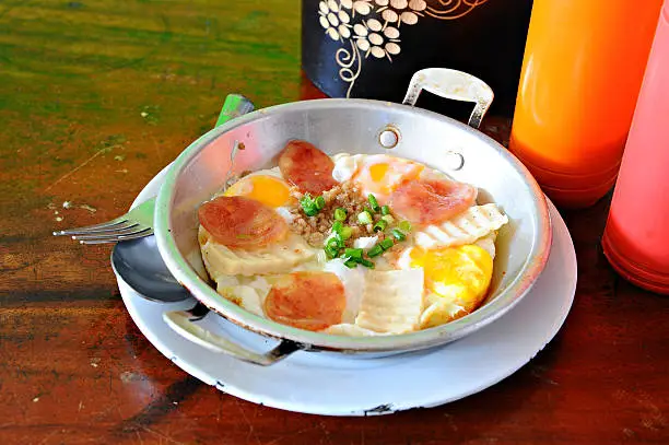 Photo of fried egg in pan breakfast (Vietnamese style)