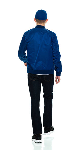 istock Rear view of male walking 535516134