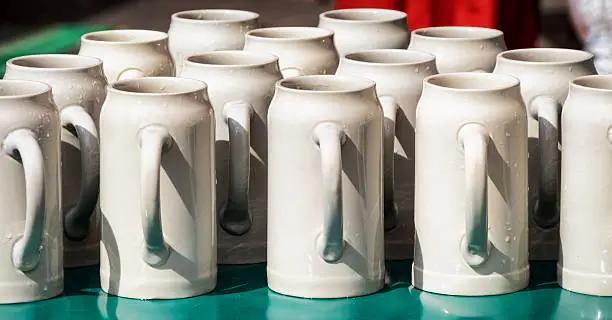 group of mugs at a bavarian beergarden