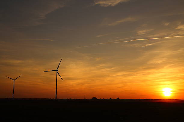istock Windmills of the sunset in the background 535517319