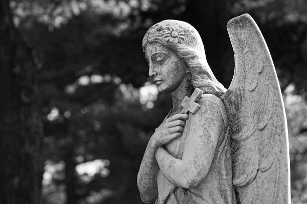 istock Beautiful statue of the angel praying 535517909