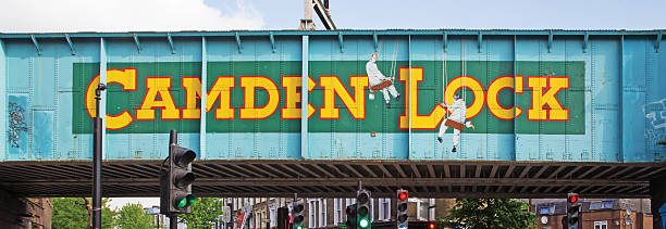 Railway bridge close to Camden Lock in London London, United Kingdom - May 26, 2016: the colorful railway bridge close to famous Camden Lock market of Camden town. camden lock stock pictures, royalty-free photos & images