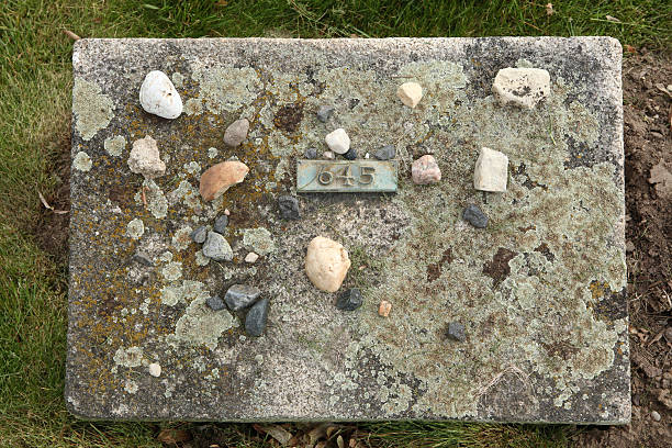 istock Jewish stones put on a grave in Terezin. 535518541