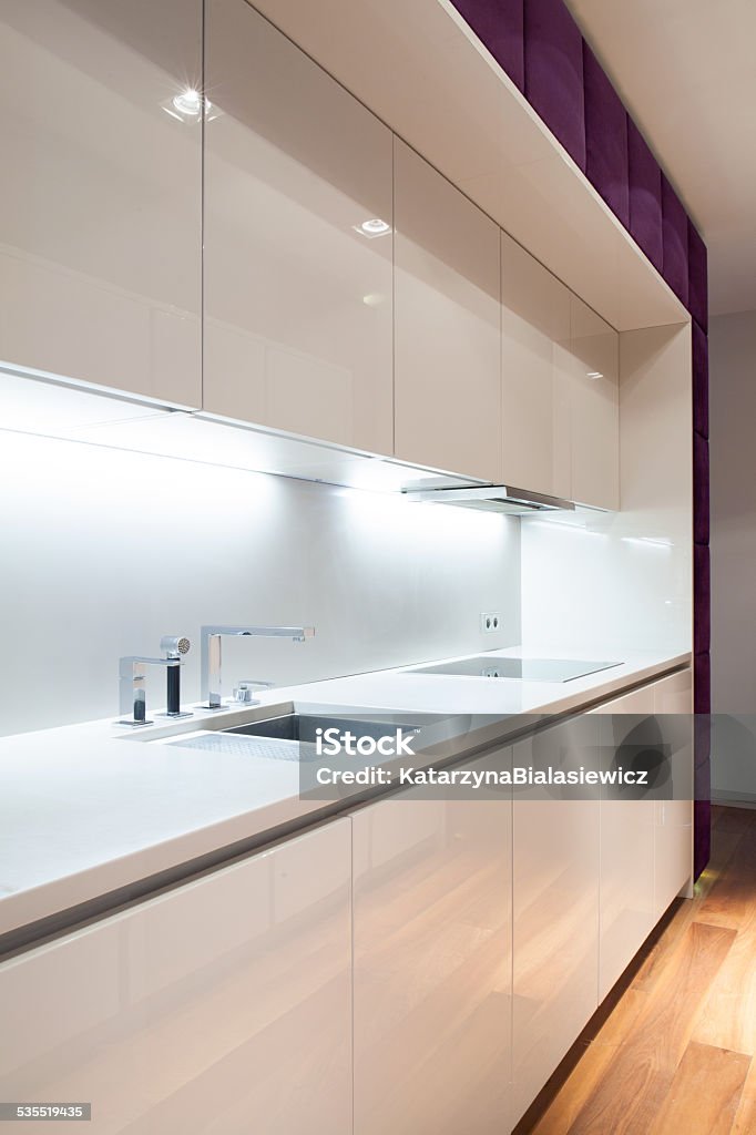 Interior of white, modern kitchen Interior of white and modern kitchen, vertical 2015 Stock Photo