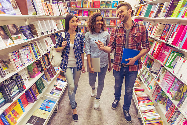 istock Young people at the book shop 535523182