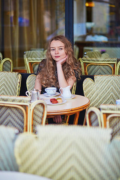 istock Beautiful Parisian woman in cafe 535523694