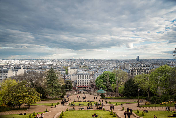 View of Paris and the centre of Paris at sunset, as seen from the steps at Sacré Coeur, Montmartre, Paris