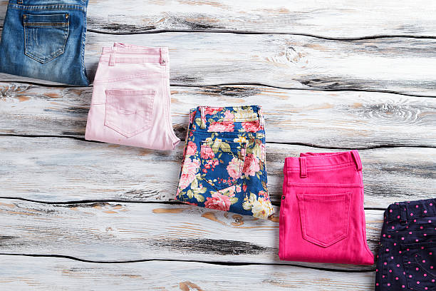 istock Pink trousers and blue jeans. 535524524
