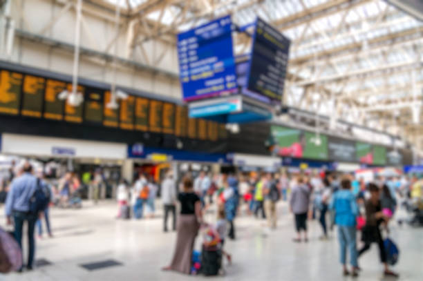 istock Blurry crowded bokeh background of train station. 535526116