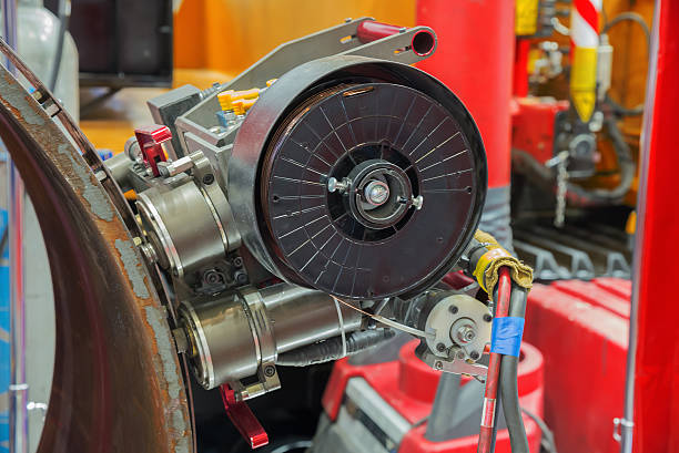 istock robot with wire spool for welding gas and water pipes 535526270