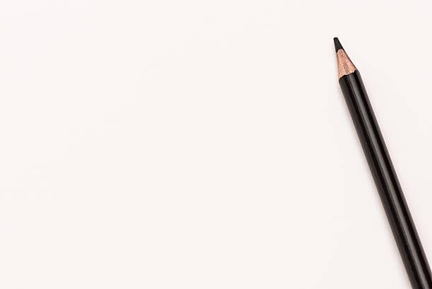 istock black pencil lay on white background, school design 535527044