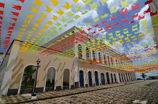 During the month of June in the Northeast side of Brazil there are traditional festivals, with typical dances, and foods. It's a tradition to decorate the streets with colorful flags.