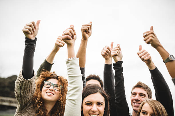 istock Multiracial adult - thumbs up 535535911