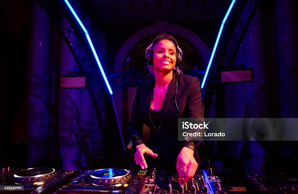 female DJ performing DJ Stock Photo