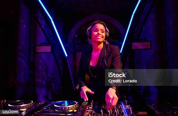 Female Dj Performing Stock Photo - Download Image Now - DJ, Party - Social Event, Dance Music