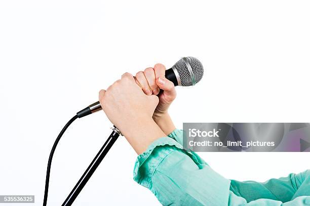 Female Hand With Microphone Stock Photo - Download Image Now - 2015, Adult, Arts Culture and Entertainment