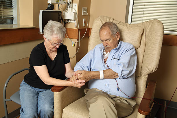 istock Couple Praying in Hospital 535536553