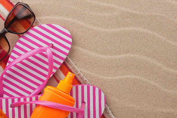 istock Accessories for the beach lying on the sand 535536993