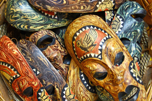 Heap of many ethnical authentic masks Heap of many ethnical authentic masks ceremonial dancing stock pictures, royalty-free photos & images