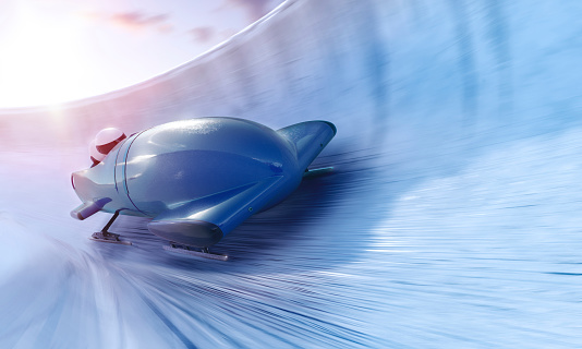 Bobsleigh team is riding on a high speed in a turn - full 3D