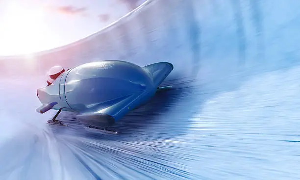 Bobsleigh team is riding on a high speed in a turn - full 3D