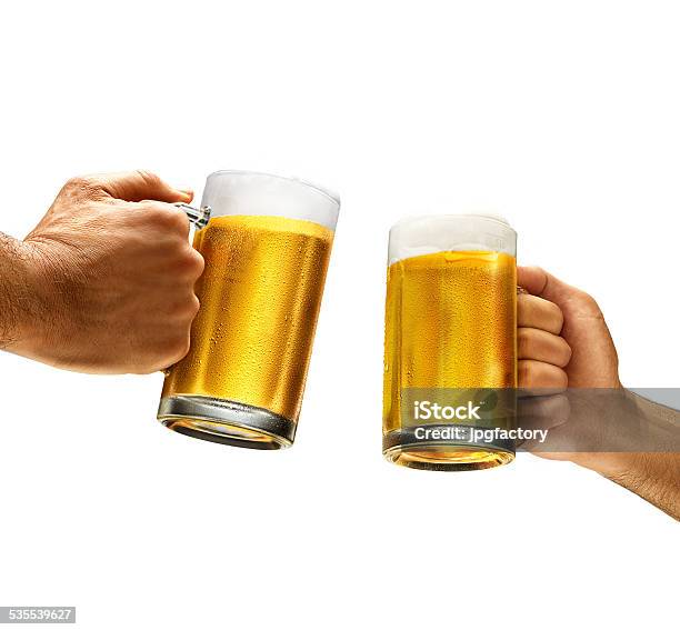 Holding Cold Beer For Cheers Stock Photo - Download Image Now - Beer - Alcohol, Celebratory Toast, Cut Out