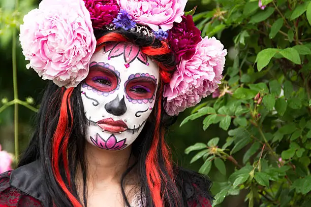 Photo of Day of the Dead bride, horizontal, closeup almost smiling.