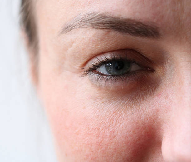 istock green-blue eye in young woman 535540388